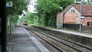 Link to Video | footage, United Kingdom, track, waiting, level crossing, Full High Definition, England, color, Great Britain, 2016, road, rail transport, daytime, boom barrier