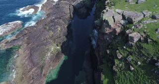 Link to Video | Scottish Highlands, footage, rock, United Kingdom, raw material, sea, Stoer, Rohfilm, Scotland, color, Stoer Head Lighthouse, 4K resolution, 2018, lighthouse, aerial shot, daytime, cliffed coast, coast