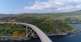 Link to Video | girder bridge, Scottish Highlands, footage, bridge, United Kingdom, raw material, Loch Cairnbawn, Rohfilm, Scotland, color, concrete, 4K resolution, 2018, aerial shot, Kylesku Bridge, tubular bridge