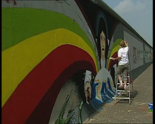 Link to Video | graffiti, street art, 1990, mural, color, Ramo, Berlin Wall, Berlin, art, work of art