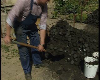 Link to Video | residential building, fossil fuel, German Democratic Republic, 1990, color, standard-definition television, coal, 1990s, bituminous coal, Betacam SP, eastern Germany