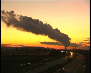Link to Video | Lower Bavaria, Bundesautobahn 92, afterglow, fume, nuclear power, private transport, Germany, cooling tower, 1990, 4:3, color, standard-definition television, Essenbach, highway, red, steam, orange, controlled-access highway, sky, Isar Nuclear Power Plant, evening, cloud cover, Bavaria