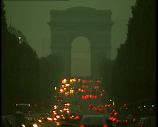 Link to Video | passenger car, tourist destination, France, motor car, private transport, megacity, metropolis, 1991, color, standard-definition television, 1990s, Europe, megalopolis, avenue des Champs-Élysées, tourist attraction, night, Arc de Triomphe, Betacam SP, Paris