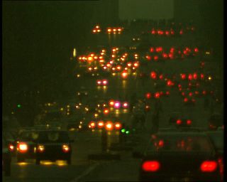 Link to Video | passenger car, tourist destination, France, motor car, private transport, megacity, metropolis, 1991, color, standard-definition television, 1990s, Europe, megalopolis, avenue des Champs-Élysées, tourist attraction, night, Arc de Triomphe, Betacam SP, Paris