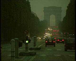 Link to Video | passenger car, tourist destination, France, motor car, private transport, megacity, metropolis, 1991, color, standard-definition television, 1990s, Europe, megalopolis, avenue des Champs-Élysées, tourist attraction, night, Arc de Triomphe, Betacam SP, Paris