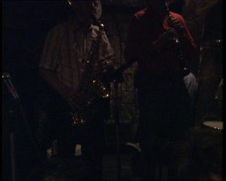 Link to Video | tourist destination, France, nightlife, jazz club, megacity, leisure, metropolis, sound on tape, 1991, color, standard-definition television, 1990s, Europe, megalopolis, Le Caveau de la Huchette, night, music, evening, Betacam SP, Paris