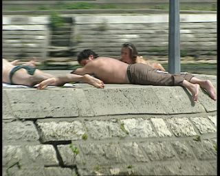 Link to Video | tourist destination, France, megacity, resting, metropolis, 1991, color, lying, standard-definition television, 90s, 1990s, river, Europe, sun bathing, megalopolis, Betacam SP, Paris