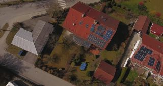 Link to Video | March, bird's-eye view, pandemic, fun, renewable energy, spring, Tischtennis, leisure, Germany, solar cell panel, color, curfew, group of houses, 4K resolution, March 27, 2020, high-angle shot, table tennis, alternative energy, aerial shot, hobby, table for table tennis, Schäftlarn, day, motion, roof, solar thermal collector, family, Bavaria