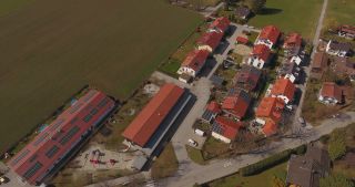 Link to Video | March, bird's-eye view, pandemic, fun, renewable energy, spring, Tischtennis, leisure, Germany, solar cell panel, color, curfew, group of houses, 4K resolution, March 27, 2020, high-angle shot, table tennis, alternative energy, aerial shot, hobby, table for table tennis, Schäftlarn, day, motion, roof, solar thermal collector, family, Bavaria