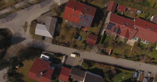 Link to Video | March, bird's-eye view, pandemic, fun, renewable energy, spring, Tischtennis, leisure, Germany, solar cell panel, color, curfew, group of houses, 4K resolution, March 27, 2020, high-angle shot, table tennis, alternative energy, aerial shot, hobby, table for table tennis, Schäftlarn, day, motion, roof, solar thermal collector, family, Bavaria