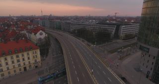 Link to Video | March, bird's-eye view, pandemic, big city, Munich, Germany, curfew, 2020, high-angle shot, horizon, aerial shot, Vogelperspektive, emptiness, evening, architectural structure, SARS-CoV-2, COVID-19, Donnersberg bridge, Bavaria