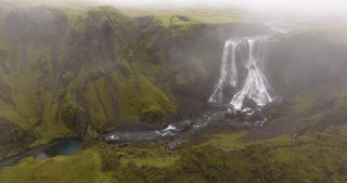 Link to Video | landscape, tourist destination, Iceland, Nature in art, Scandinavia, color, liquid water, waterfall, Europe, aerial shot, tourist attraction, nature