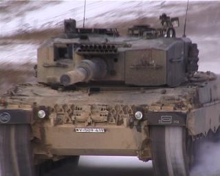 Link to Video | September, tank, Leopard 2, military training area, 2000, 4:3, color, standard-definition television, Fahren, military exercise, Bundeswehr, Krauss-Maffei Wegmann, snow, Main battle tank