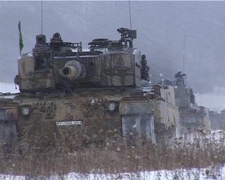 Link to Video | September, tank, Leopard 2, military training area, 2000, 4:3, color, standard-definition television, Fahren, military exercise, Bundeswehr, Krauss-Maffei Wegmann, snow, Main battle tank