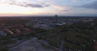Link to Video | October, autumn, Olympic Stadium of Munich, big city, Munich, 2020, wide shot, Olympiapark, horizon, aerial shot, sky, tourist attraction, evening, cloud cover, Bavaria