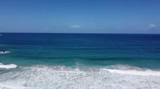 Link to Video | landscape, Red Frog Beach Island Resort, tourist destination, sea, Bocas del Toro Province, color, 2020, liquid water, Isla Bastimentos, tourism region, beach, 2K resolution, aerial shot, Caribbean, paid time off, Panama