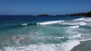 Link to Video | landscape, Red Frog Beach Island Resort, tourist destination, sea, Bocas del Toro Province, color, 2020, liquid water, Isla Bastimentos, tourism region, beach, 2K resolution, aerial shot, Caribbean, paid time off, Panama