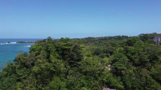 Link to Video | landscape, Red Frog Beach Island Resort, tourist destination, sea, Bocas del Toro Province, color, 2020, liquid water, Isla Bastimentos, tourism region, beach, 2K resolution, aerial shot, Caribbean, paid time off, Panama