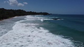 Link to Video | landscape, Red Frog Beach Island Resort, tourist destination, sea, Bocas del Toro Province, color, 2020, liquid water, Isla Bastimentos, tourism region, beach, 2K resolution, aerial shot, Caribbean, paid time off, Panama