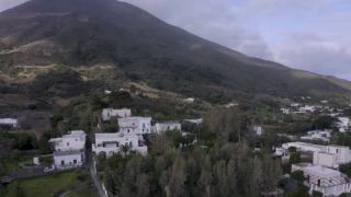 Link to Video | Stromboli, color, 4K resolution, tilt, Italy, Europe, aerial shot, Mediterranean Basin, volcano