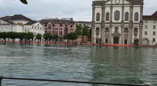 Link to Video | climate change, Switzerland, Reuss, Lucerne, amateur film, flood, boom barrier