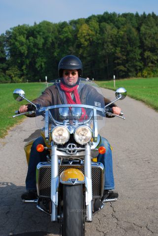 Link to Photo | cruiser, motorcycle, golden yellow, motorcyclist, Triumph Rocket III