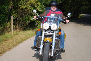 Link to Photo | cruiser, motorcycle, golden yellow, motorcyclist, Triumph Rocket III