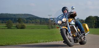 Link to Photo | cruiser, motorcycle, golden yellow, motorcyclist, Triumph Rocket III