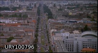 Link to Photo | big city, Mitte, private transport, Germany, metropolis, 1990, screenshot, color, 35 mm film, point-of-view shot, 90s, 1990s, aerial shot, capital city, photographic film, Berlin, Karl-Marx-Allee, West Germany, Berlin Babylon, documentary film, driving