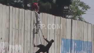 Link to Video | March 14, Agence France-Presse