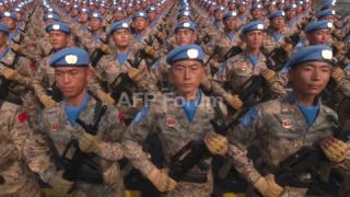 Link to Video | military parade, show of force, March 14, Agence France-Presse, parade