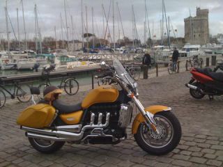 Link to Photo | cruiser, photograph, France, 2009, amateur photography, color, Vieux-Port de La Rochelle, Charente-Maritime, motorcycle, golden yellow, port, hobby, city, La Rochelle, Triumph Rocket 3, Triumph Rocket III, luxury good