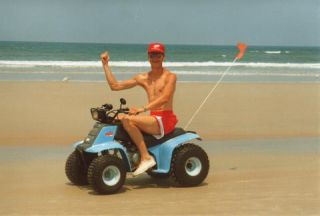 Link to Photo | photograph, physical strength, 1992, color, United States of America, 1990s, quad bike, beach, male, paid time off