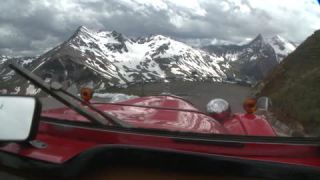 Link to Video | luxury, hairpin turn, Alps, windshield, 16:9, motor car, Mercedes-Benz type 124, high mountains, Full High Definition, list of Mercedes-Benz vehicles, rally, sound on tape, Edelweissspitze, color, collectible, point-of-view shot, red, Fahren, passion, Grossglockner, road, Mercedes-Benz, Carinthia, Austria, Europe, mountain range, hobby, antique car, classic car, convertible, Mercedes-Benz W120, day, Eastern Alps, High Tauern, Grossglockner High Alpine Road, trip, Bergstraße, cloud cover, Vötter, Vötters Fahrzeugmuseum, luxury good, driving