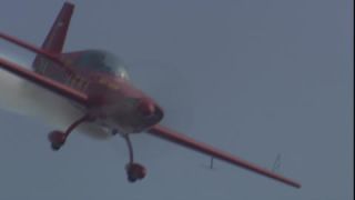 Link to Video | airplane with propellers, air show, occurrence, 16:9, event, Full High Definition, Leki Lenhart, Germany, acrobatics, airplane, 2009, flight, color, spectacle, red, aerobatic maneuver, aerobatics, AERO Friedrichshafen, Europe, aerialist, hobby