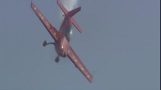 Link to Video | airplane with propellers, air show, occurrence, 16:9, event, Full High Definition, Leki Lenhart, Germany, acrobatics, airplane, 2009, flight, color, spectacle, red, aerobatic maneuver, aerobatics, AERO Friedrichshafen, Europe, aerialist, hobby