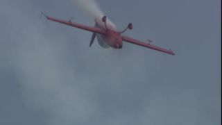 Link to Video | airplane with propellers, air show, occurrence, 16:9, event, Full High Definition, Leki Lenhart, Germany, acrobatics, airplane, 2009, flight, color, spectacle, red, aerobatic maneuver, aerobatics, AERO Friedrichshafen, Europe, aerialist, hobby