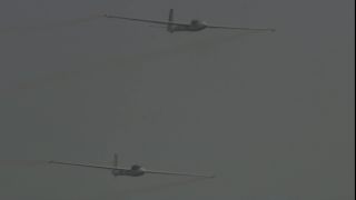 Link to Video | airplane with propellers, air show, smoke, show, recurring event, Full High Definition, acrobatics, airplane, 2009, sound on tape, flight, low-angle shot, color, spectacle, aerobatic maneuver, AERO Friedrichshafen, Europe, sky, trade fair, aviation