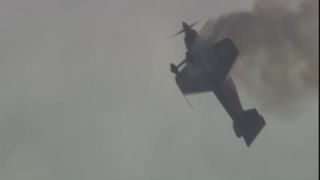 Link to Video | airplane with propellers, air show, smoke, show, recurring event, Full High Definition, acrobatics, airplane, 2009, sound on tape, flight, low-angle shot, color, spectacle, aerobatic maneuver, AERO Friedrichshafen, Europe, sky, trade fair, aviation