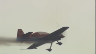 Link to Video | airplane with propellers, air show, smoke, show, recurring event, Full High Definition, acrobatics, airplane, 2009, sound on tape, flight, low-angle shot, color, spectacle, aerobatic maneuver, AERO Friedrichshafen, Europe, sky, trade fair, aviation