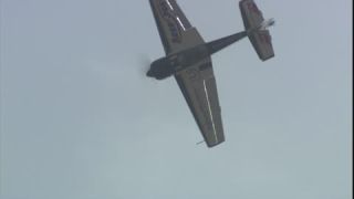 Link to Video | airplane with propellers, air show, smoke, show, recurring event, Full High Definition, acrobatics, airplane, 2009, sound on tape, flight, low-angle shot, color, spectacle, aerobatic maneuver, AERO Friedrichshafen, Europe, sky, trade fair, aviation